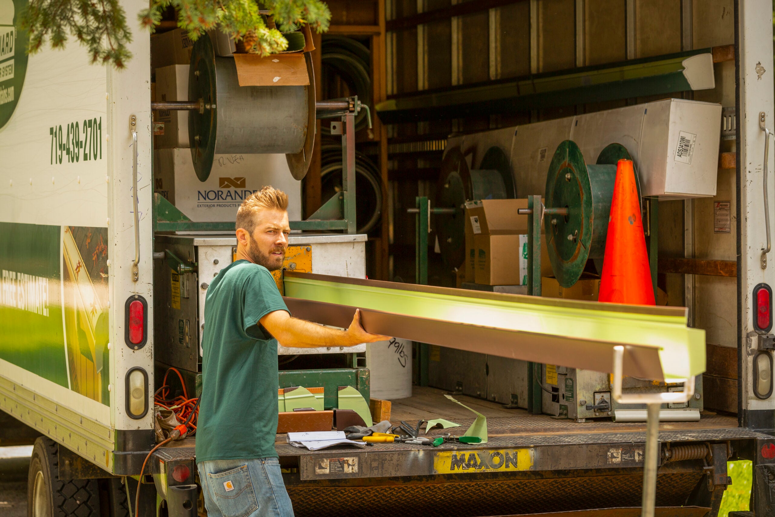 Ladi printing gutters. KGuard leaf free gutter trough being fabricated on-site. royal brown gutter. Seamless gutter. Better than Sectional Gutter. Made to size. Made specifically for your home. Bespoke Gutters
