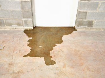 Water Coming Through Basement Floor - K-Guard Rocky Mountains. Wet cement floor. Wet basement floor. Water coming in through foundation.
