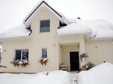 House Covered in Heavy Snow - K-Guard Rocky Mountains